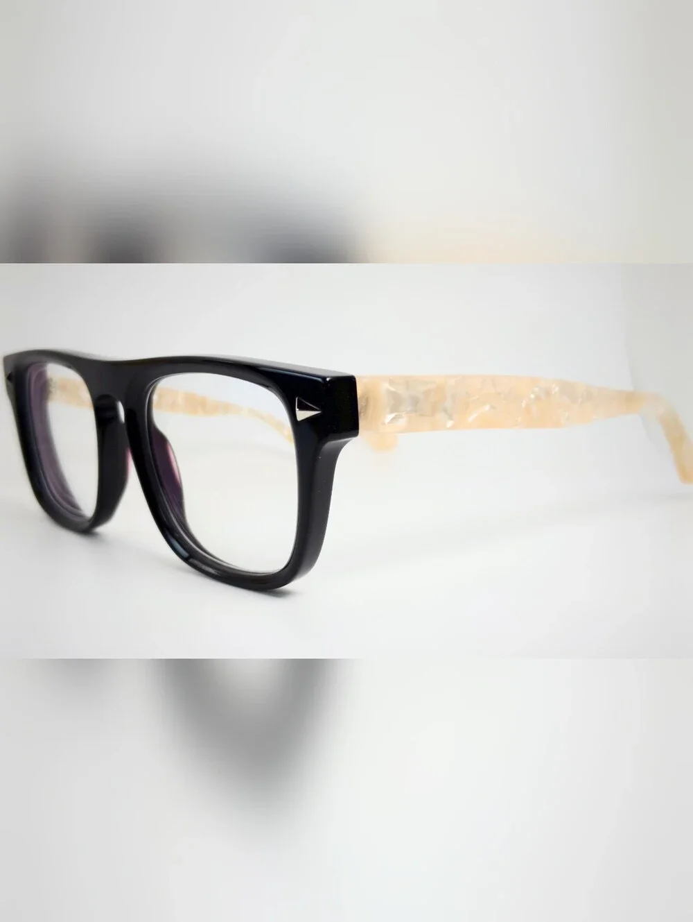 Fluoresce. Black Wayfarer-Style Eyeglasses with Pearl Temples.